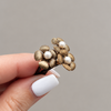 Set Of Three Antique Gold Flower Hair Grips