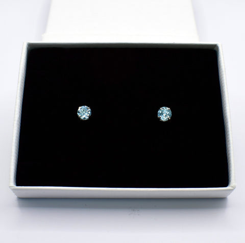 Sterling Silver Blue Topaz Claw Set Stud Earrings