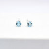 Sterling Silver Blue Topaz Claw Set Stud Earrings
