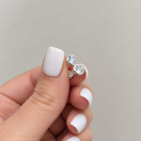 Silver Blue Topaz Round Stud Earrings