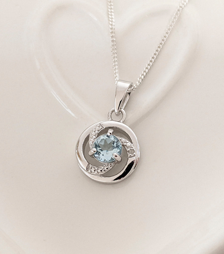 Sterling Silver Open Circular Blue Topaz Necklace